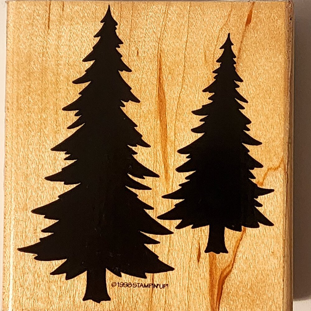 Stampin' Up! Christmas tree rubber stamp on a wood block.